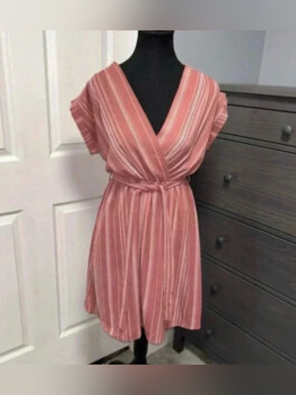Monteau pink and white striped v-neck mini sundress with a waist-tie belt.